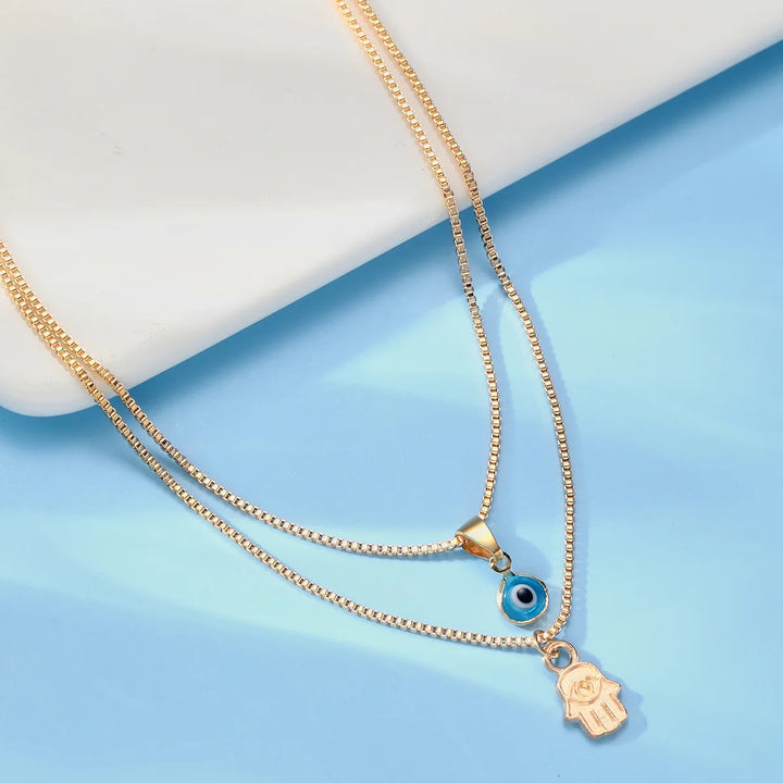 Evil Eye & Hamsa Necklace by weston.®